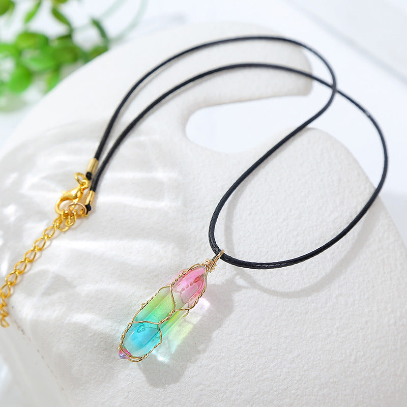 Rainbow crystal pendant necklace with gold wire wrap on black cord – colorful minimalist jewelry for women