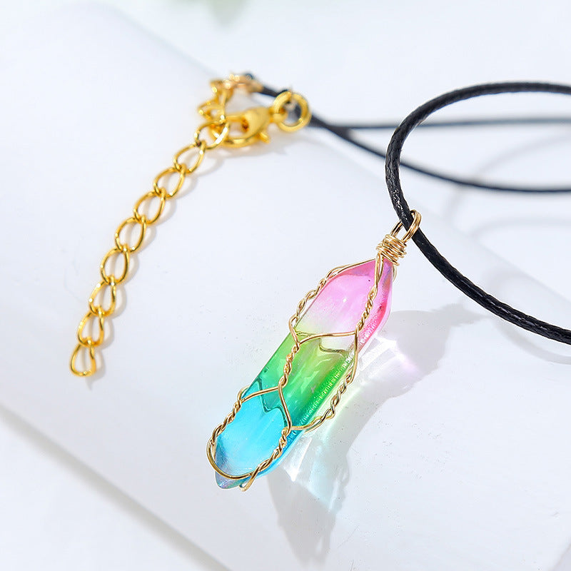 Rainbow crystal pendant necklace with gold wire wrap on black cord – colorful minimalist jewelry for women